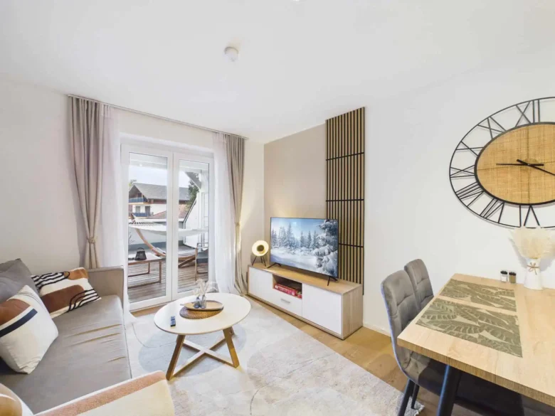 Our apartments 3 Wohnzimmer Velden TV | Ossiachersee Residences
